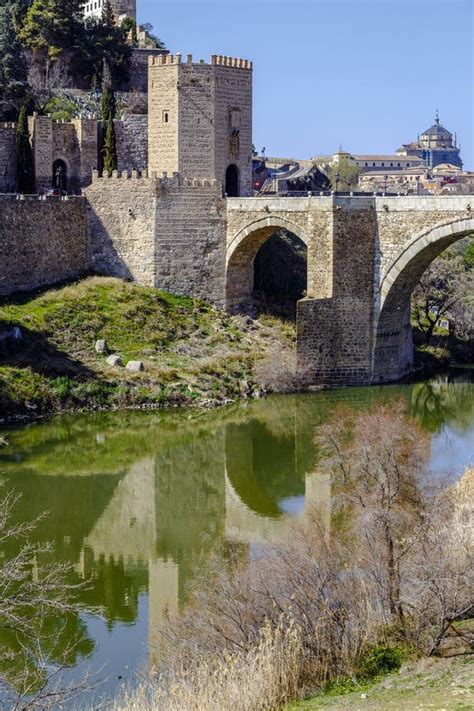 The Alcantara Bridge Over The Tagus River, Toledo Spain Stock Photo ...