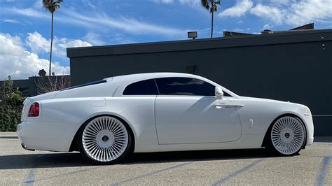 Tyga Rolls Royce White