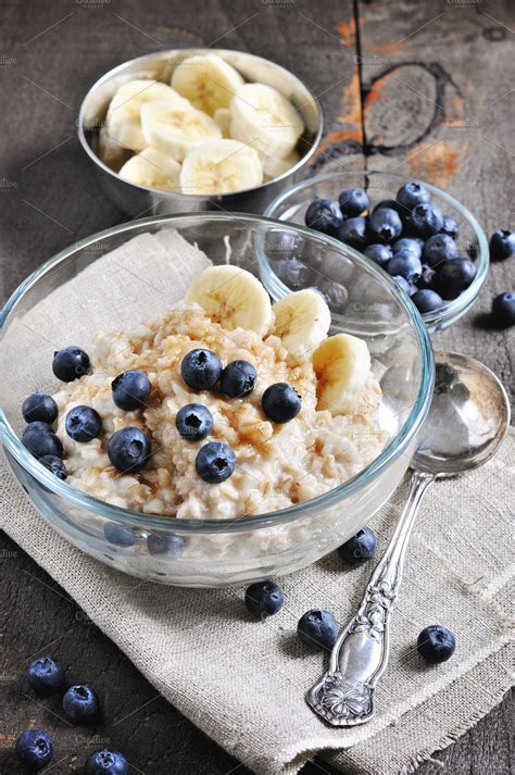 Oatmeal with banana & blueberries | High-Quality Food Images ~ Creative ...