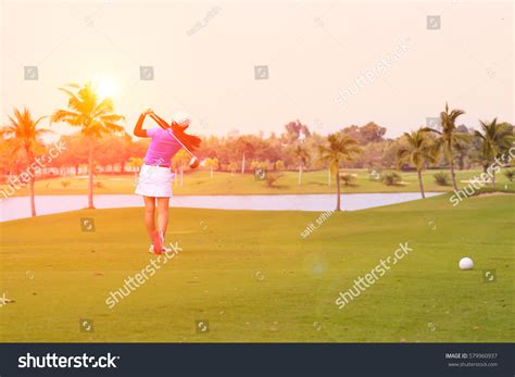 Female Golf Player Swinging Golf On Stock Photo (Edit Now) 579960937