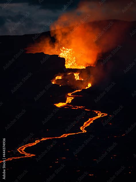 Crater eruption and glowing river of magma from Fagradalsfjall Volcanic ...