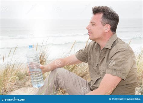 Alone Man on Beach Summer Drinking Water from the Bottle Stock Photo - Image of lifestyle ...