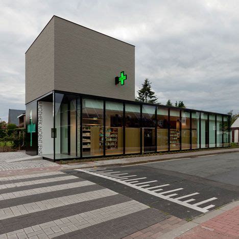 Minimalistic Exterior Design Creates Modern Look For Belgian Pharmacy | Healthcare architecture ...