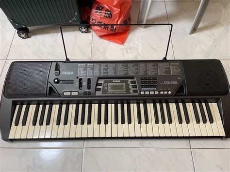 Casio Keyboard with stand and score stand , Hobbies & Toys, Music & Media, Musical Instruments ...