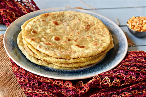 Puran poli a delicious traditional flat bread filled with sweetened chickpeas and spices served ...