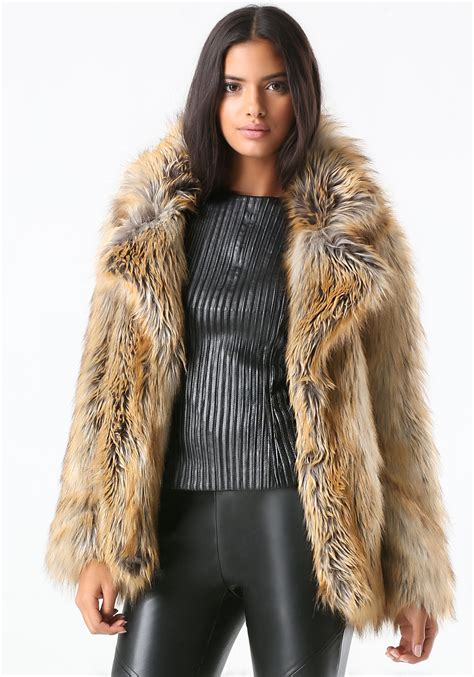 Bebe Glam Faux Fur Coat in Natural | Lyst