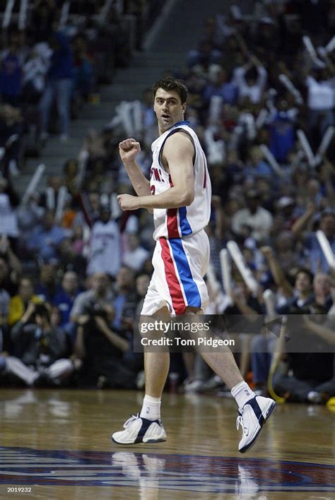 Mehmet Okur of the Detroit Pistons celebrates against the New Jersey ...