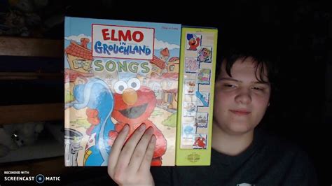 elmo in grouchland songs play a song book - YouTube