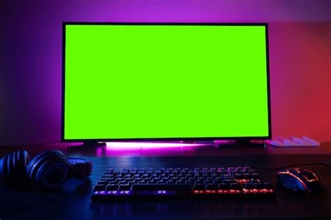 Premium Photo | Green screen monitor with powerful personal computer for cyber sports gamer at ...