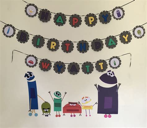 Storybots banner and robots I made out of cardstock for Wyatt's birthday, using Design Space on ...