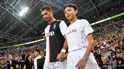 Cristiano Ronaldo Fans In Asia Attempt To Get Close To Him With Wildly ...