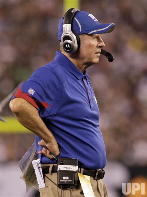 New York Giants head coach Tom Coughlin closes his eyes at the New ...