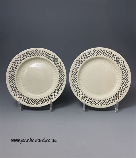 Pair of English 18th century creamware plates with reticulated borders ...