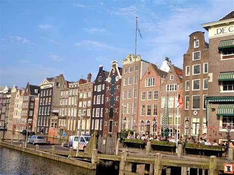 Dancing Houses on Damrak Canal in Amsterdam, Netherlands - Encircle Photos