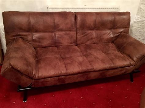 Brown sofa bed. Faux leather. Hardly used | in Kilmarnock, East Ayrshire | Gumtree