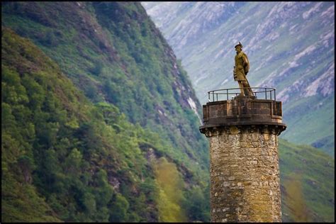 the Glenfinnan Monument at the head of Loch Shiel, Scotland, which was built to commemorate ...