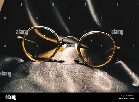 John Lennon glasses Stock Photo - Alamy