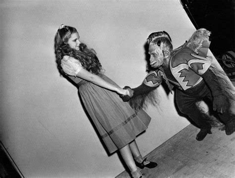 Judy Garland meeting Pat Walshe in costume as Nikko on the set of The Wizard of… | Actors ...