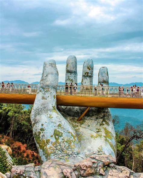 The Golden Bridge In Vietnam Looks Like It's Being Held By Two Giant Hands