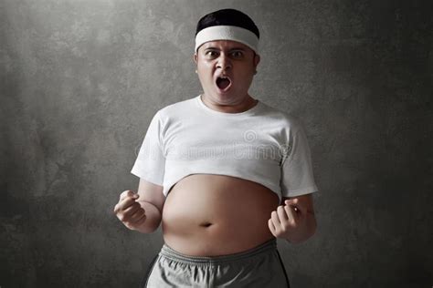 Young men with fat belly stock photo. Image of health - 225728870