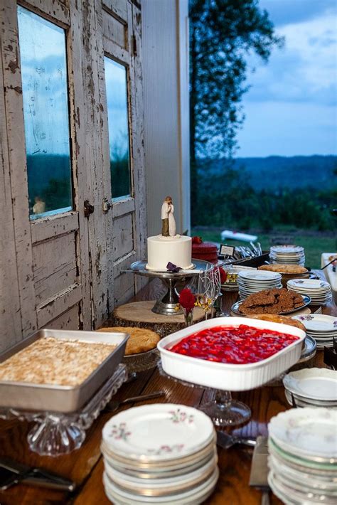 Create a sprawling, countryside dessert table with decidedly rustic, wooden accents and vintage ...