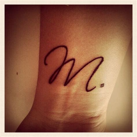 Wrist letter tattoo : M. #wristtattoo #lettertattoo #tattoo #scriptina ...