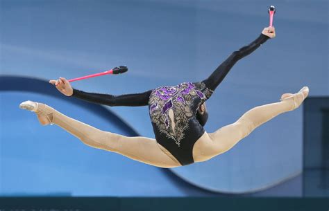 Rhythmic gymnasts seem to defy physics - CBS News