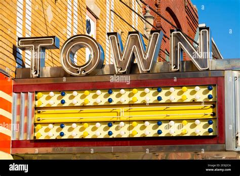 Old neon movie theater sign Stock Photo - Alamy