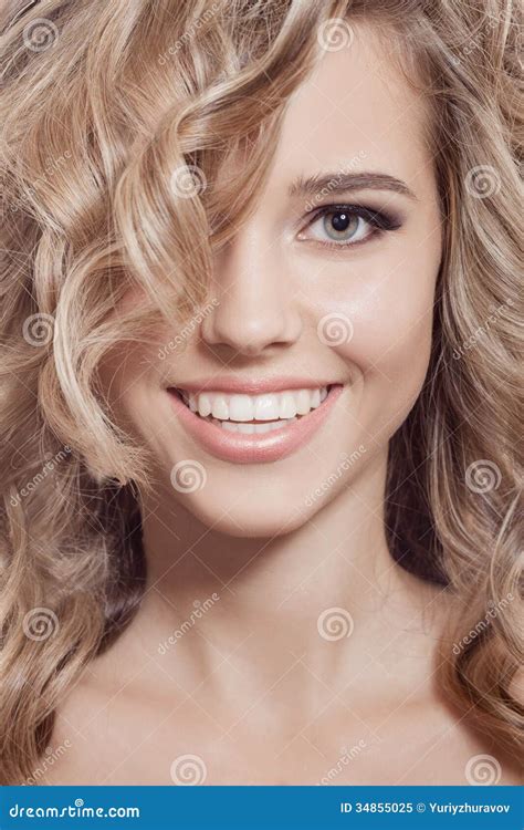 Beautiful Smiling Woman. Healthy Long Curly Hair Royalty Free Stock Photo - Image: 34855025