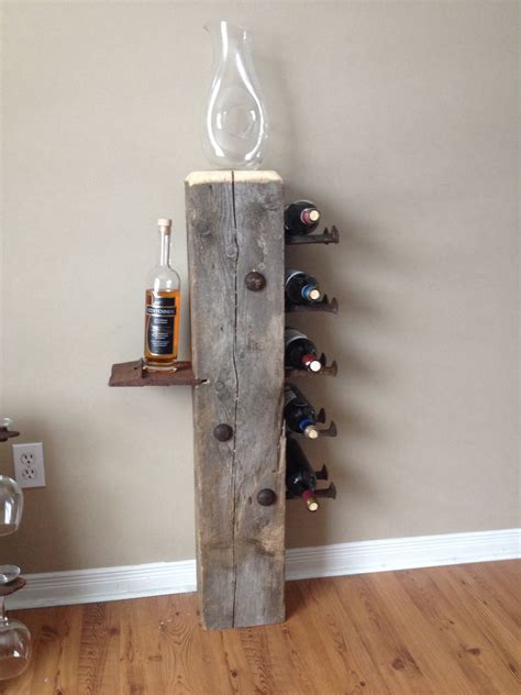 Barn beam wine rack | Railroad spikes, Railroad spike art, Barn beams