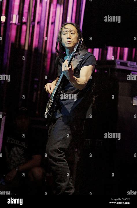 John Myung of Dream Theater performing at Manchester O2 Apollo. Manchester, England - 09.02.12 ...