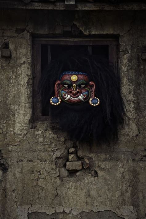 This mask represents Lakhey, a type of demon from Nepalese folklore who used to live in the ...