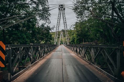 Train Track Bridge during Cloudy Skies · Free Stock Photo