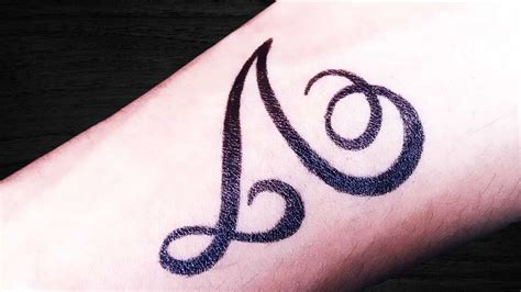 Upside Down V Tattoo Meaning: Upside Down V Symbol