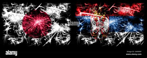 Japan, Japanese vs Serbia, Serbian New Year celebration sparkling fireworks flags concept ...