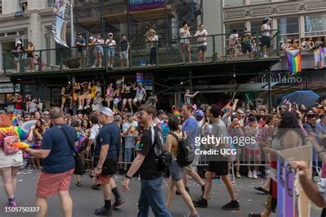 A large crowd watches the NYC Pride March 2023 on 5th Avenue, between... News Photo - Getty Images