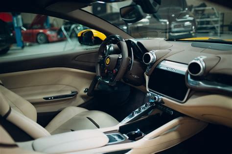 Premium Photo | Ferrari lusso cockpit interior yellow color.