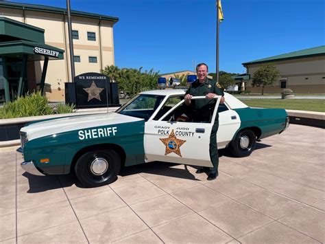 Polk County Deputies Surprise Sheriff with Replica of First Patrol Car