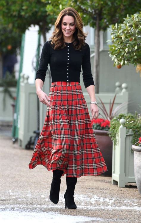 Kate Middleton looks festive in plaid skirt at Christmas party for ...