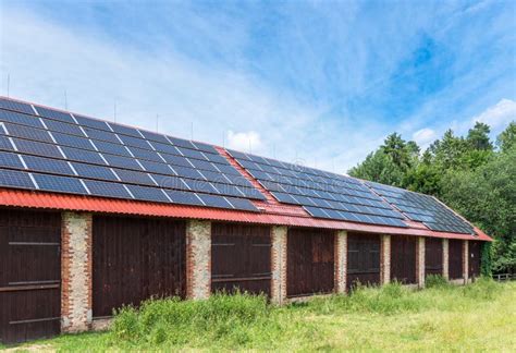 Brick Barn in a Countryside. Solar Panels Installed on the Roof of the Barn Stock Image - Image ...