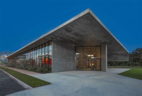 An exposed structure of glass and concrete illustrating tenets of modern architecture ...