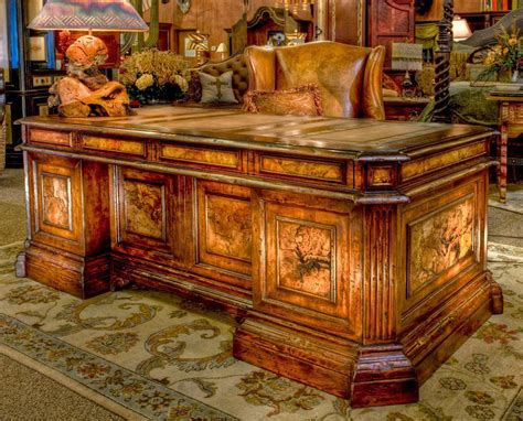 This beautiful leather inlaid top and burl wood gives grandeur to any office setting. Visit our ...