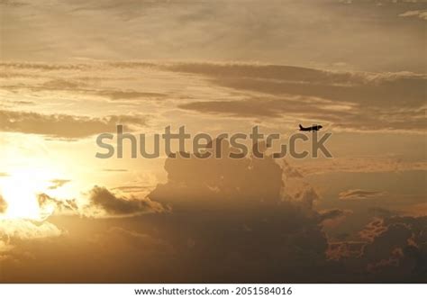 Plane Taking Off Into Sunset Stock Photo 2051584016 | Shutterstock