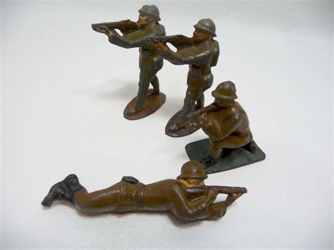 Cast metal toy soldiers. World War II. Belgian army. Memorabilia. Vintage toy. Soldier helmet ...