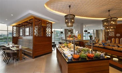 4* Breakfast or Dinner Buffet: Child AED 39, Adult AED 49 or AED 69 - Garden Grille at Hilton ...