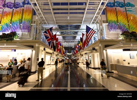 View inside O'Hare International Airport Terminal 5 showing the flags of different countries ...