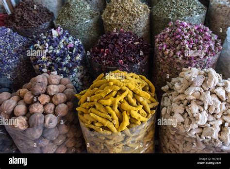 Sack full of flower petals, Arabian spices, spice, cooking spices, nutmeg, yellow chilli, white ...