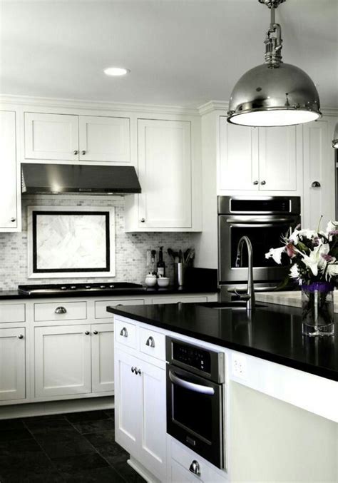 Pin by Jay Kamara Frederick on black and white kitchen | White kitchen ...