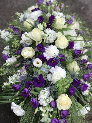 Purple and white casket spray – buy online or call 0121 706 2905