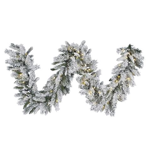 Shop Vickerman Pre-Lit 9-ft L Snow Ridge Garland with White LED Lights at Lowes.com